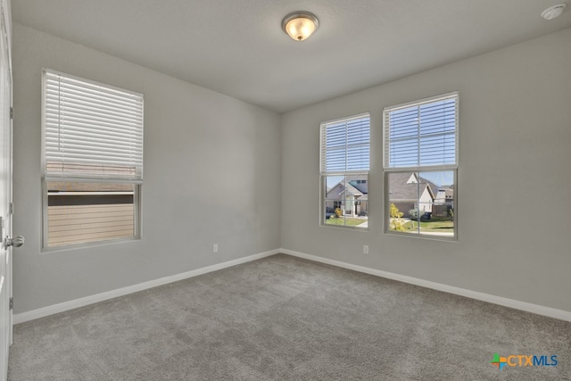 view of carpeted spare room