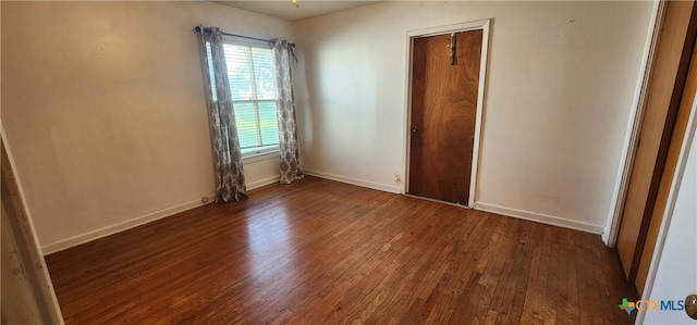 3605 Oaklawn St, Victoria, TX 77901 - unfurnished bedroom with hardwood / wood-style floors