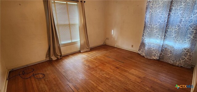 3605 Oaklawn St, Victoria, TX 77901 - unfurnished room with wood-type flooring and baseboards