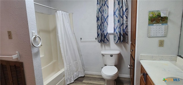 3605 Oaklawn St, Victoria, TX 77901 - full bathroom with vanity, wood finished floors, and shower / bath combination with curtain