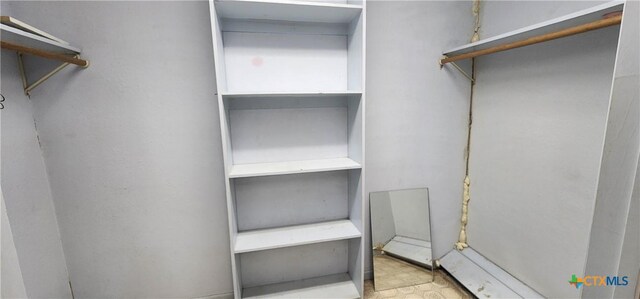 3605 Oaklawn St, Victoria, TX 77901 - walk in closet with tile patterned floors