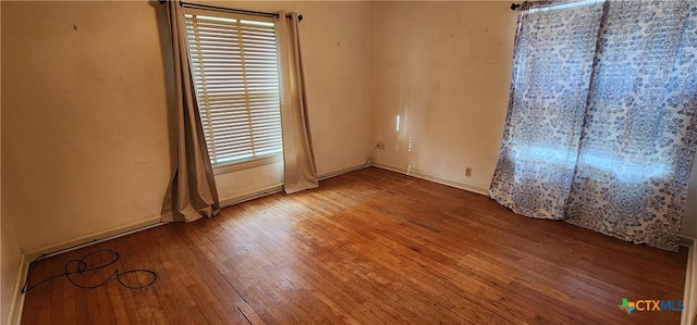 3605 Oaklawn St, Victoria, TX 77901 - spare room featuring hardwood / wood-style flooring and baseboards