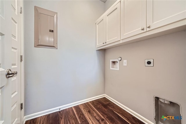 laundry area with dark wood-type flooring, hookup for a washing machine, electric panel, cabinets, and hookup for an electric dryer