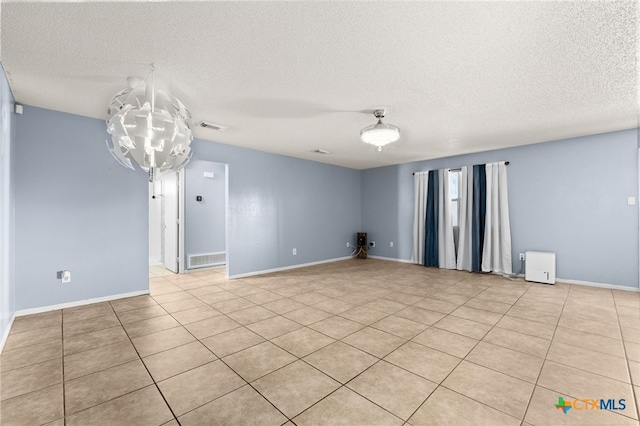 4210 Sand Dollar Dr, Killeen, TX 76549 - unfurnished room featuring a textured ceiling and light tile patterned floors