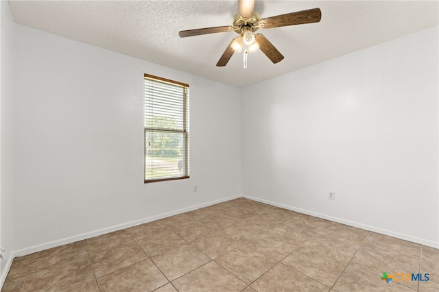 4210 Sand Dollar Dr, Killeen, TX 76549 - empty room with a ceiling fan, a textured ceiling, and light tile patterned floors