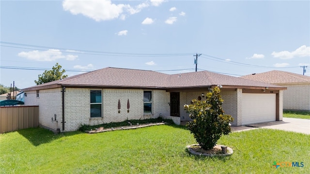 4210 Sand Dollar Dr, Killeen, TX 76549 - single story home with an attached garage, concrete driveway, brick siding, and a shingled roof
