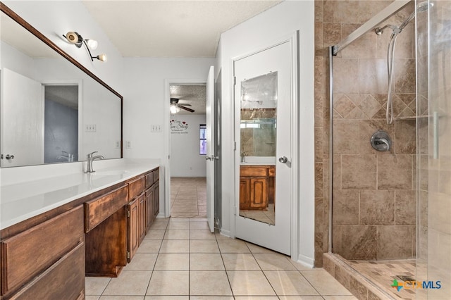 4210 Sand Dollar Dr, Killeen, TX 76549 - bathroom with tile patterned flooring, a ceiling fan, vanity, and a stall shower
