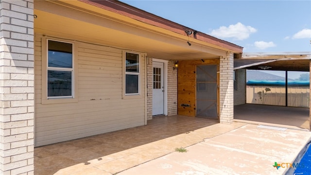 4210 Sand Dollar Dr, Killeen, TX 76549 - doorway to property with a patio and brick siding