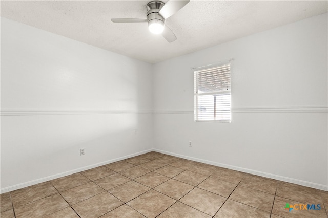 4210 Sand Dollar Dr, Killeen, TX 76549 - spare room with ceiling fan, light tile patterned flooring, and a textured ceiling