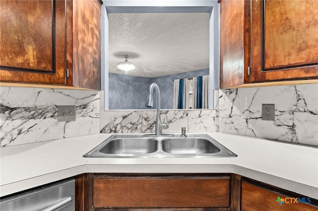 4210 Sand Dollar Dr, Killeen, TX 76549 - kitchen with stainless steel dishwasher, backsplash, a textured ceiling, and light countertops