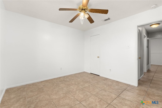 4210 Sand Dollar Dr, Killeen, TX 76549 - unfurnished room with a ceiling fan, light tile patterned floors, and a textured ceiling
