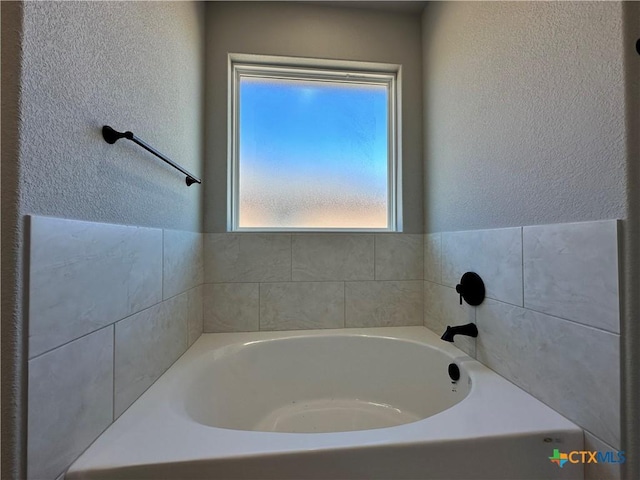 bathroom with a bath