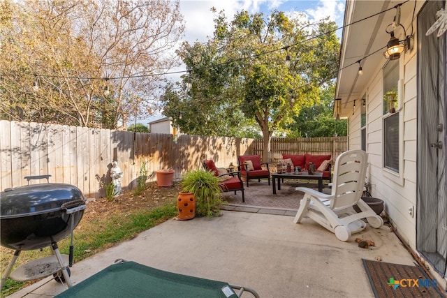 view of patio / terrace with an outdoor hangout area and a grill