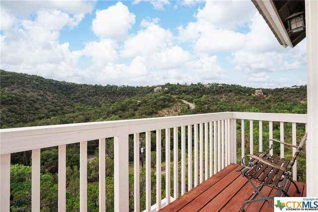 350 Climbing Way, Wimberley, TX 78676 - wooden deck featuring a forest view