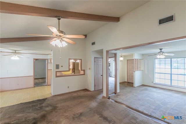 unfurnished living room featuring vaulted ceiling with beams, visible vents, baseboards, a ceiling fan, and carpet