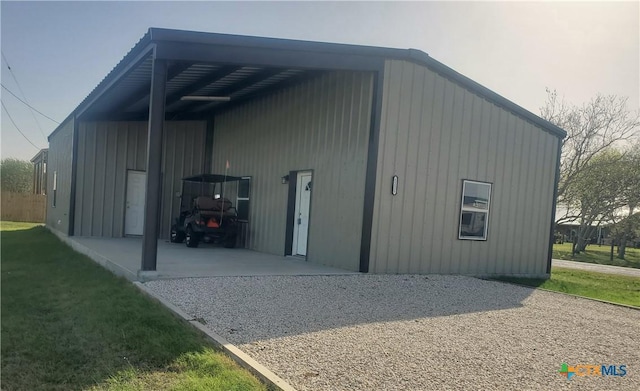 1211 W Houson Ave, Seadrift, TX 77983 - view of pole building featuring a carport and a yard