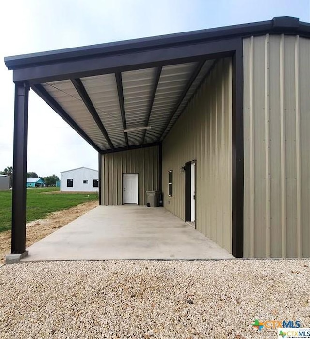 1211 W Houson Ave, Seadrift, TX 77983 - exterior space featuring an attached carport