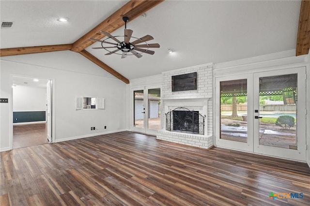 4101 Briar Cliff Rd, Temple, TX 76502 - unfurnished living room featuring french doors, ceiling fan, wood finished floors, and a fireplace