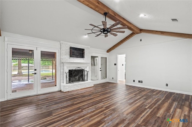 4101 Briar Cliff Rd, Temple, TX 76502 - unfurnished living room with ceiling fan, a brick fireplace, and dark wood-type flooring