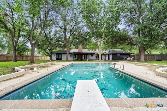 4101 Briar Cliff Rd, Temple, TX 76502 - view of swimming pool featuring a patio and a diving board