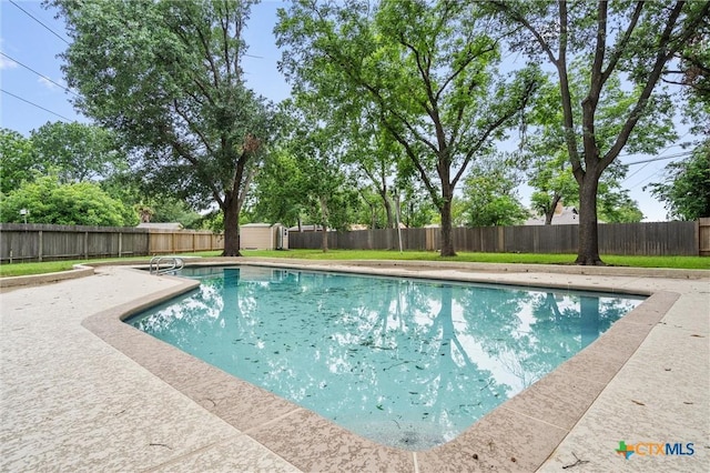 4101 Briar Cliff Rd, Temple, TX 76502 - view of swimming pool with a storage shed, a fenced backyard, and a patio