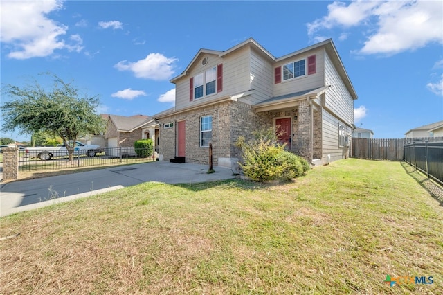 view of front of house with a front lawn and a patio