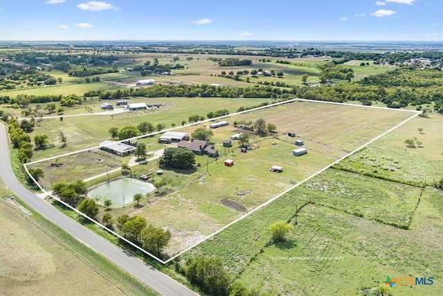 bird's eye view with a water view and a rural view