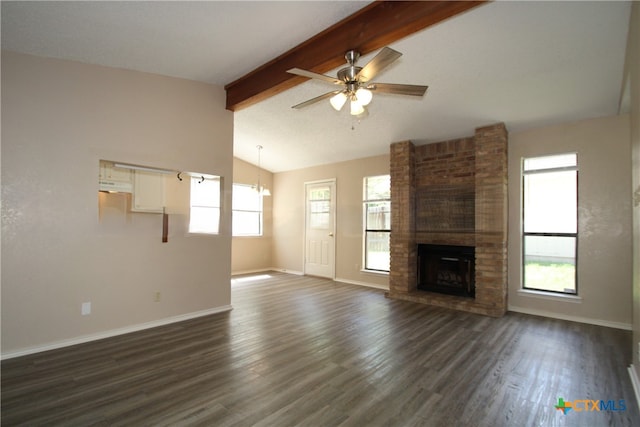 unfurnished living room with vaulted ceiling with beams, a brick fireplace, ceiling fan, and dark wood-type flooring