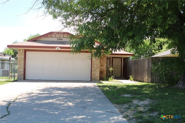 ranch-style home with a garage