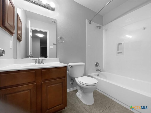 full bathroom with tile patterned floors, vanity, toilet, and shower / washtub combination