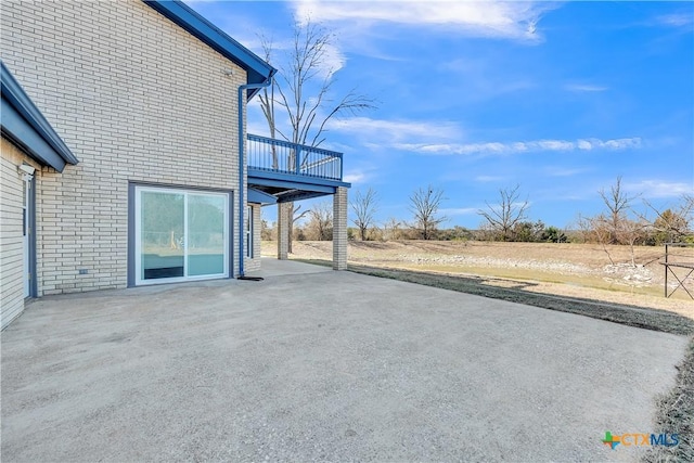 view of patio / terrace featuring a wooden deck