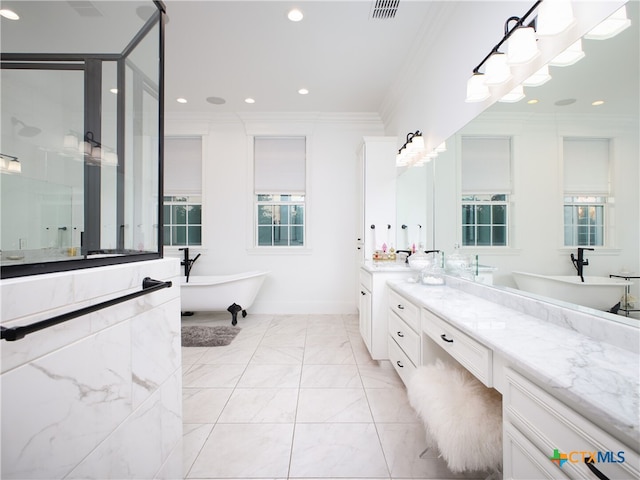 full bathroom featuring vanity, visible vents, recessed lighting, a freestanding bath, and crown molding