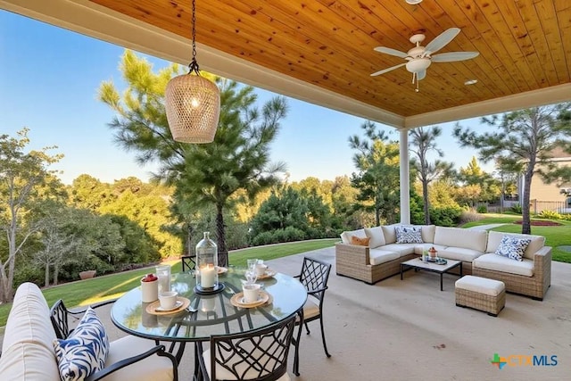 107 Onini Ct, Bastrop, TX 78602 - view of patio featuring an outdoor living space, outdoor dining space, and ceiling fan