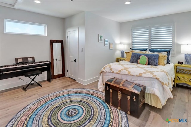 bedroom featuring light wood-type flooring