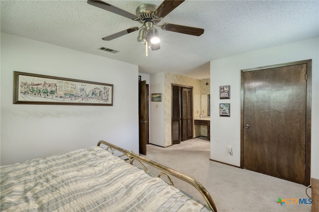 1104 Saint Williams Ave, Round Rock, TX 78681 - carpeted bedroom with a textured ceiling and a ceiling fan