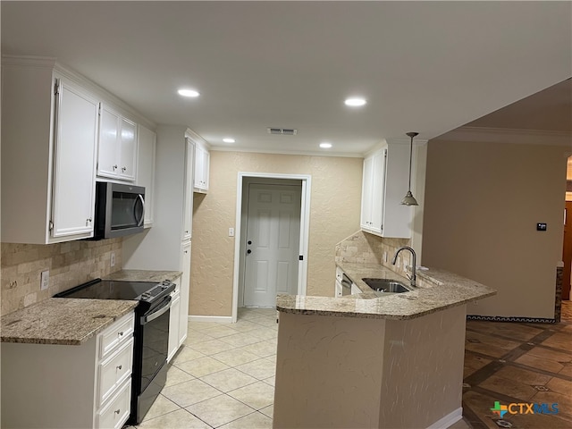 kitchen featuring white cabinets, kitchen peninsula, black / electric stove, and light stone counters