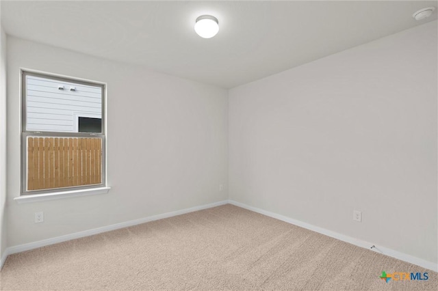 spare room with carpet flooring