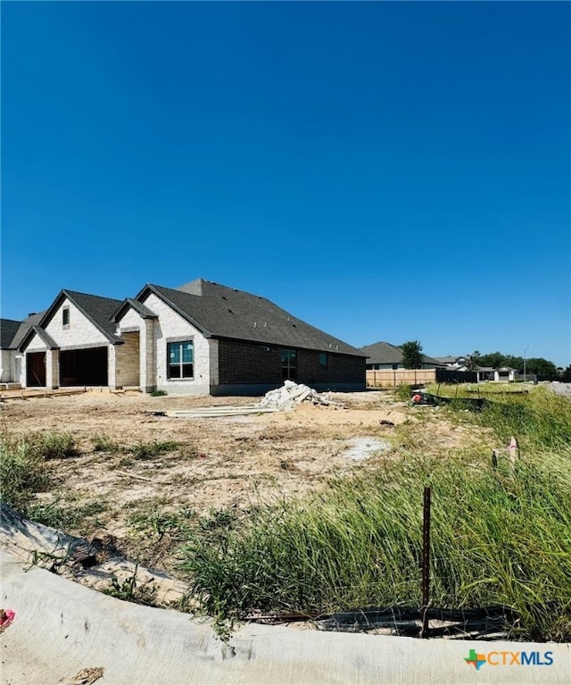 exterior space with a garage