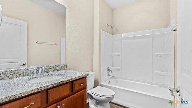 647 Ridgeglen Dr, New Braunfels, TX 78130 - bathroom with vanity, washtub / shower combination, and toilet