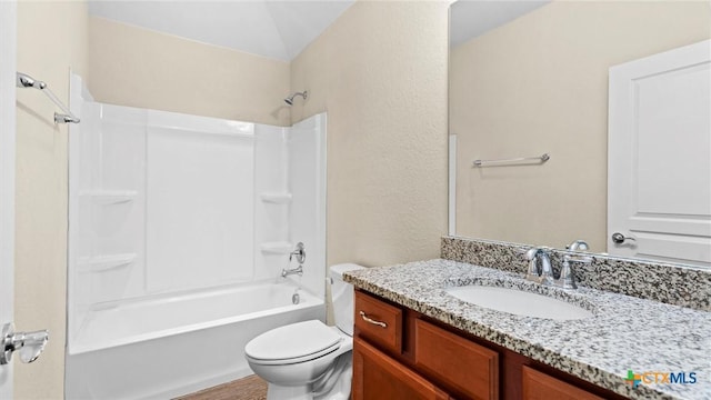 647 Ridgeglen Dr, New Braunfels, TX 78130 - bathroom with vanity, toilet, shower / washtub combination, wood finished floors, and a textured wall
