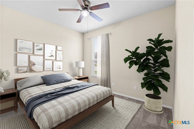 647 Ridgeglen Dr, New Braunfels, TX 78130 - bedroom with carpet floors, baseboards, and a ceiling fan