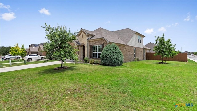 647 Ridgeglen Dr, New Braunfels, TX 78130 - view of front facade with concrete driveway and brick siding