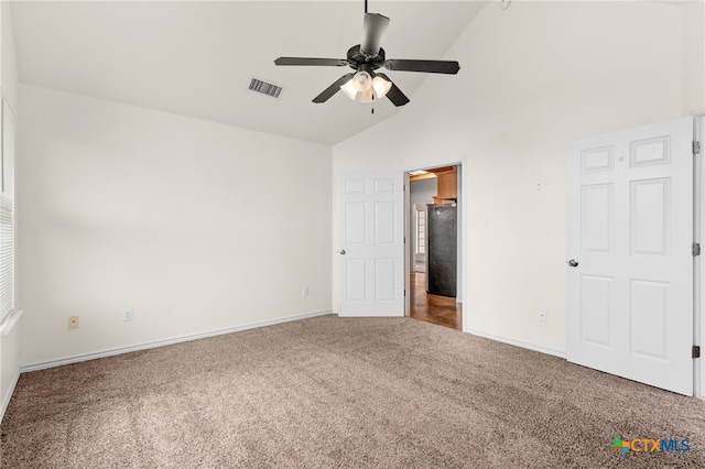 2301 Big Divide Rd, Copperas Cove, TX 76522 - unfurnished bedroom featuring carpet flooring, baseboards, high vaulted ceiling, and ceiling fan