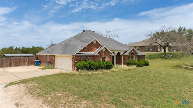 2301 Big Divide Rd, Copperas Cove, TX 76522 - view of front of home with driveway, a garage, and brick siding