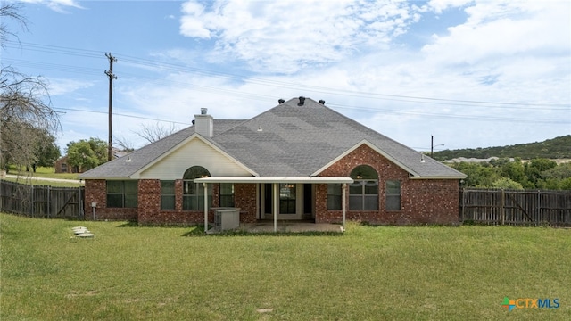 2301 Big Divide Rd, Copperas Cove, TX 76522 - ranch-style home featuring roof with shingles, brick siding, and a chimney