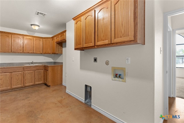 2301 Big Divide Rd, Copperas Cove, TX 76522 - laundry room with cabinet space, baseboards, hookup for a gas dryer, electric dryer hookup, and washer hookup