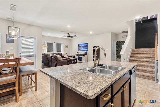 kitchen featuring recessed lighting, visible vents, stainless steel dishwasher, a sink, and light tile patterned flooring