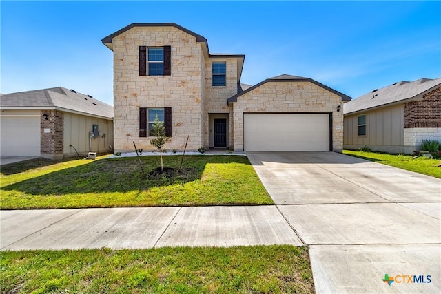 view of front facade with an attached garage, stone siding, a front yard, and concrete driveway
