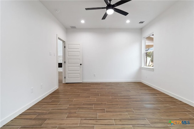 empty room featuring ceiling fan