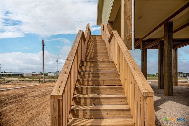 193 Powderhorn Ln, Port Lavaca, TX 77979 - interior space featuring white cabinetry, baseboards, and dark wood-type flooring